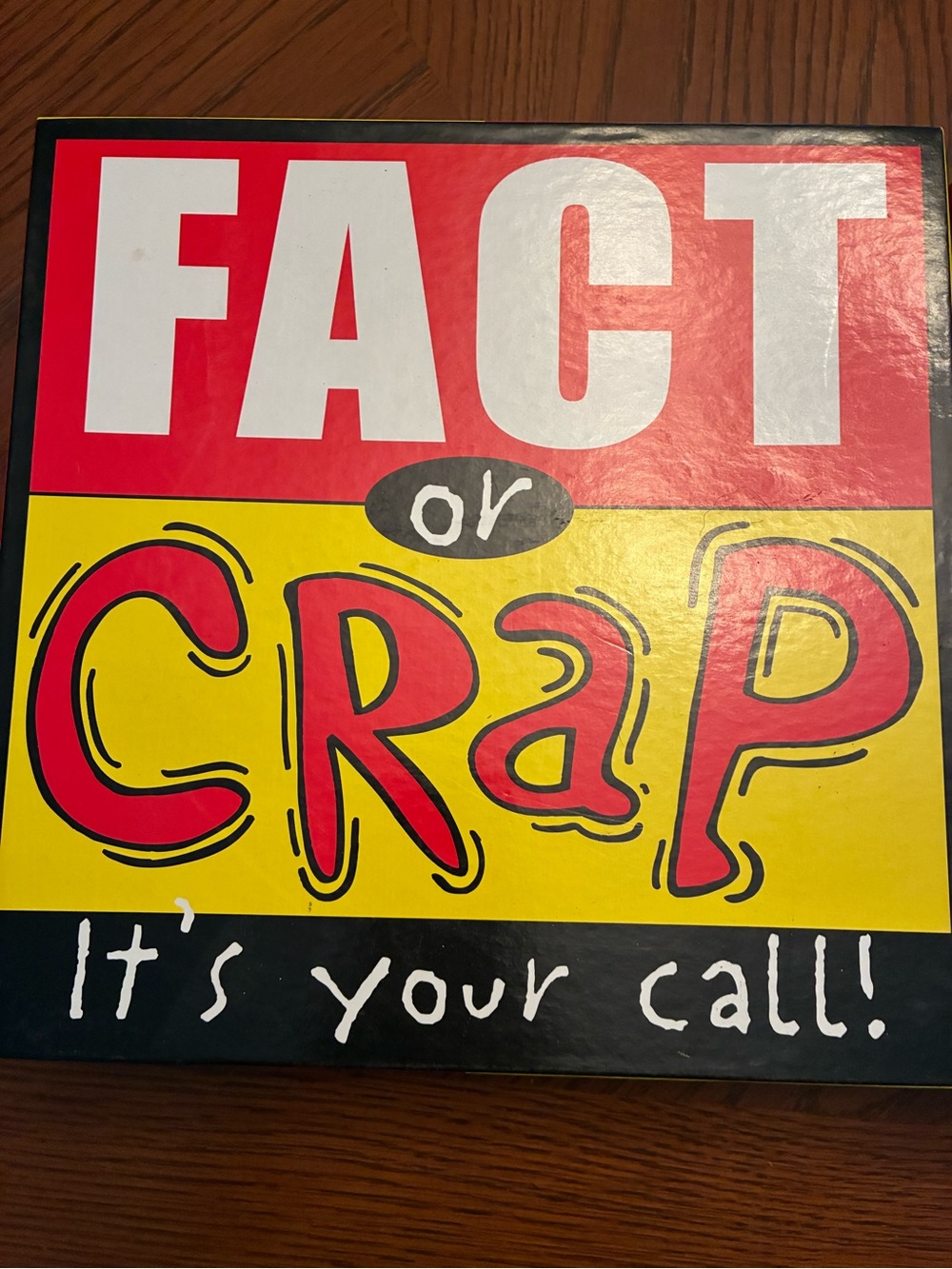 Fact or Crap Party Game - Bright Yellow and Red Box